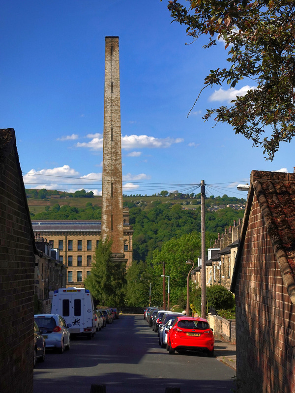 2025.68.115: Salts Mill chimney from Rhodes Street. Digital image credit: Saltaire Collection