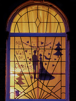 2025.68.3: Saltaire Advent Window (Man and woman). Digital image credit: Saltaire Collection