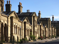 2025.68.104: Saltaire Almshouses on Victoria Road. Digital image credit: Saltaire Collection