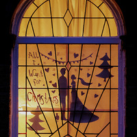 2025.68.3: Saltaire Advent Window (Man and woman). Digital image credit: Saltaire Collection
