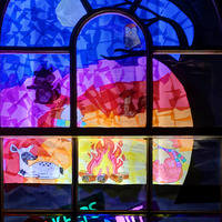 2025.68.16: Saltaire Advent Window (Rainbow campfire). Digital image credit: Saltaire Collection