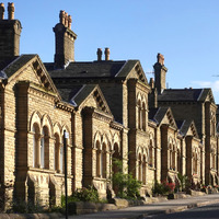 2025.68.104: Saltaire Almshouses on Victoria Road. Digital image credit: Saltaire Collection